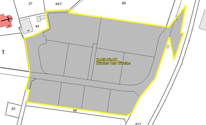 Bebauungsplan mit gelber Umrandung um die betroffenen Flurstücke